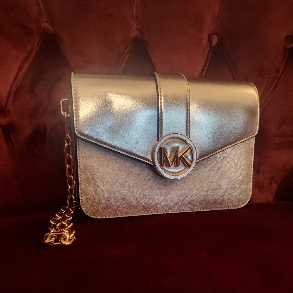 Michael kors carmen medium convertible shoulder bag gold pale.